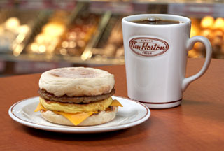 Brits try Tim Horton's Breakfast for the first time!! 